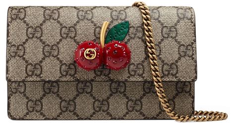 gucci sling bag with cherry.